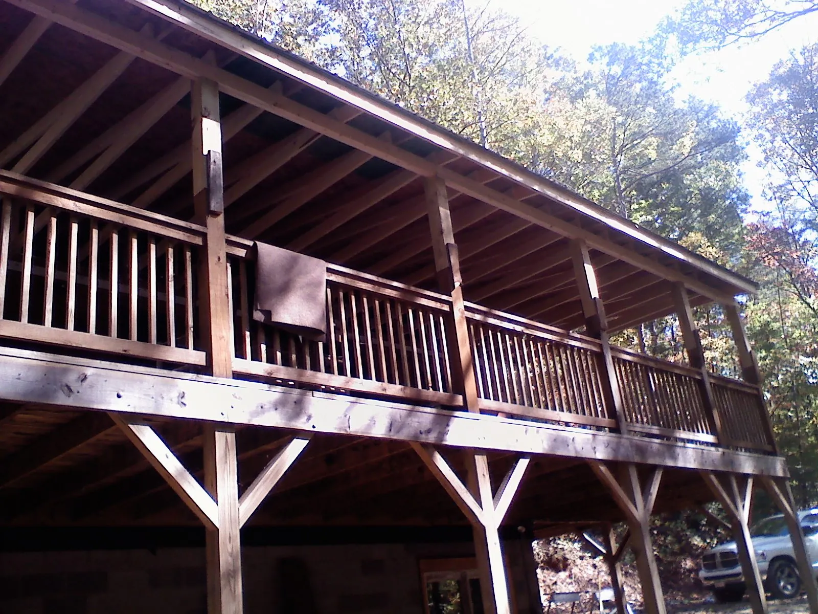 Timber framing under a new elevated porch and deck — Roof Leak Repair in Sweetwater by Roofing Brothers